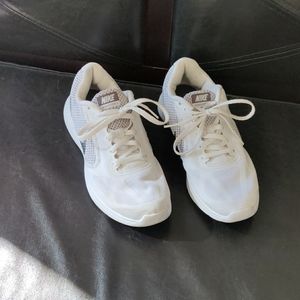 Women's white Nike shoes